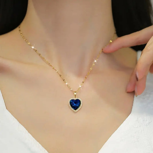 Elegant Golden-Tone Heart Pendant Necklace with Blue Gemstone & Cubic Zirconia